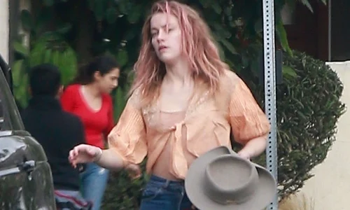 *EXCLUSIVE* Amber Heard looks a little disheveled as she leaves a friends house jpeg