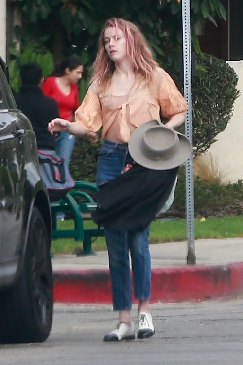 *EXCLUSIVE* Amber Heard looks a little disheveled as she leaves a friends house jpeg
