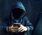 Hacker cu smartphone FOTO Shutterstock