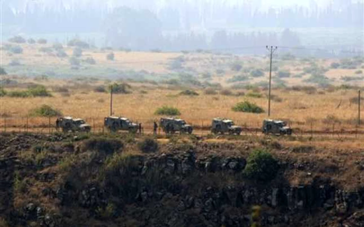 Trupe israeliene în apropiere de localitatea libaneză Wazzani, ocupată de Hezbollah FOTO naharnet.com