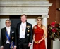 Regina Maxima a Olandei în rochie roșie semnată Claes Iversen. FOTO: Profimedia