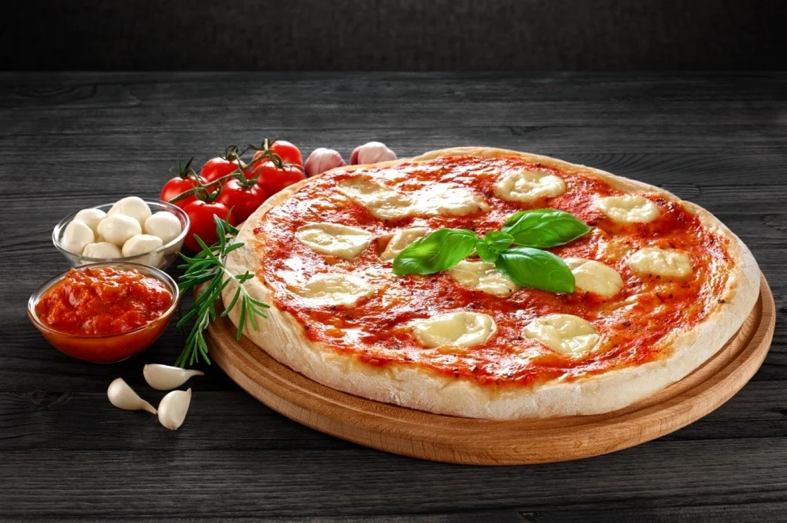 FOTO: Pizza Margherita are nevoie doar de două minute pentru a se coace perfect FOTO: academiabarilla.com