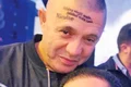 Nicolae Guţă a trecut  pe la salonul de tatuaj jpeg