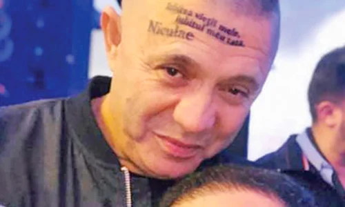 Nicolae Guţă a trecut  pe la salonul de tatuaj jpeg