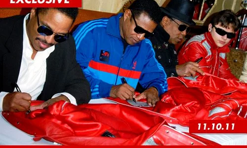 1115 jacksons signing 3 ex jpeg