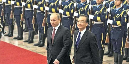Putin se întoarce cu tolba plină din China