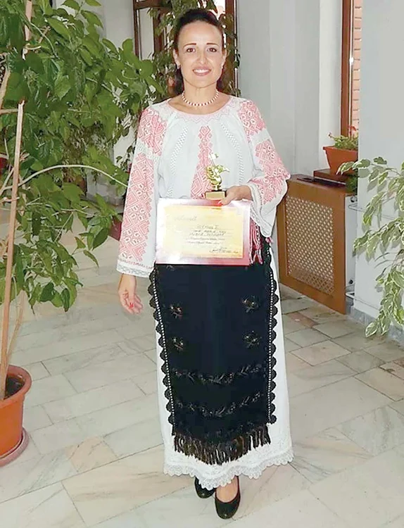 Tânăra a câştigat  multe trofee  ca solistă de  muzică populară