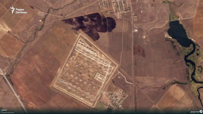O imagine din satelit surprinde fum în zona depozitului de muniție FOTO RBC Ucraina