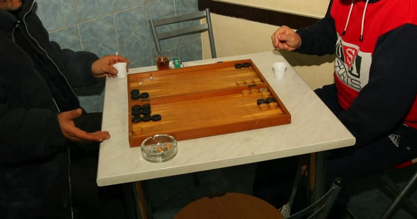 Cei doi săteni au jucat table în casa victimei.