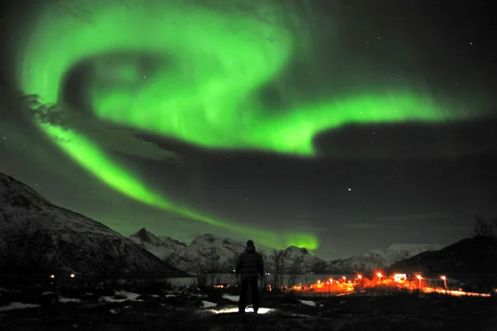 Aurora boreală, în oraşul Tromsoe, din nordul Norvegiei