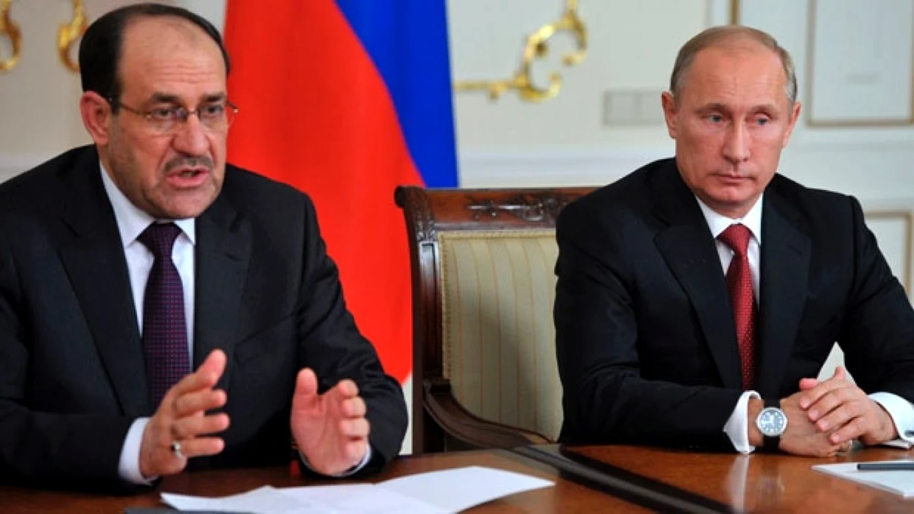 Premierului irakian Nouri al-Maliki (stângă) şi Vladimir Putin (dreapta) FOTO AP