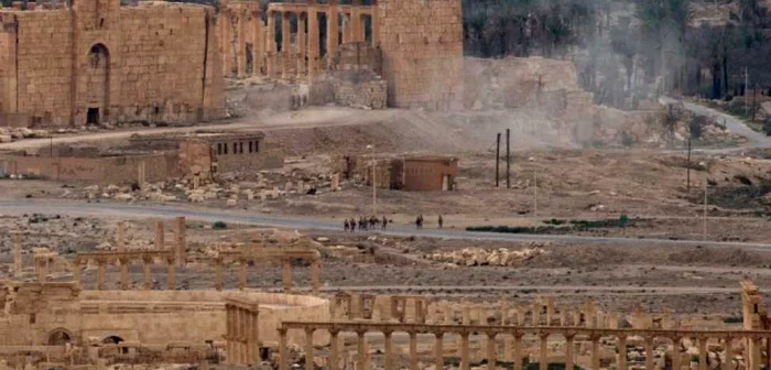 Militari ruşi după eliberarea Palmira de sub ocupaţia Statului Islamic Foto: BETA/AP