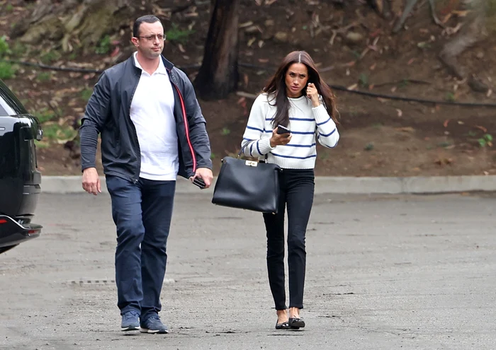 Meghan Markle, tristă pe stradă, după anunțul întreruperii contractului cu Spotify, Foto Profimedia
