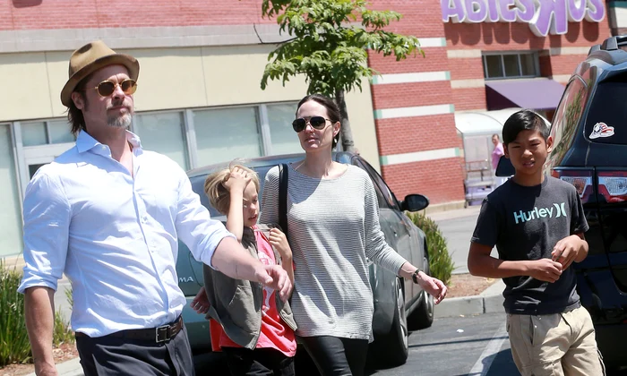 Exclusive Brad Pitt & Angelina Jolie Visits Toys R Us With Their Children jpeg