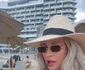 Sânziana Buruiană, cu soțul Nicolae Zuluf și fetițele la Nisipurile de aur foto: arhivă personală 