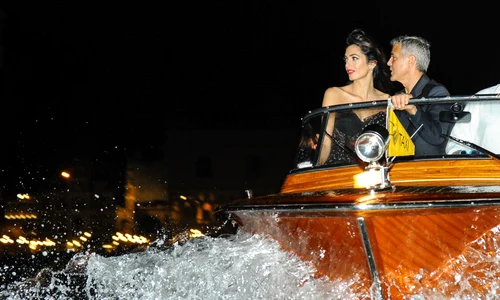 George Clooney and Amal Alamuddin seen on a taxi boat in Venice jpeg