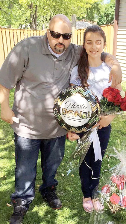 În SUA, rudele au aşteptat-o cu flori şi cu un trofeu personalizat