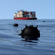 Navă container care navighează prin câmpul de mine navale în largul mării FOTO Shutterstock 