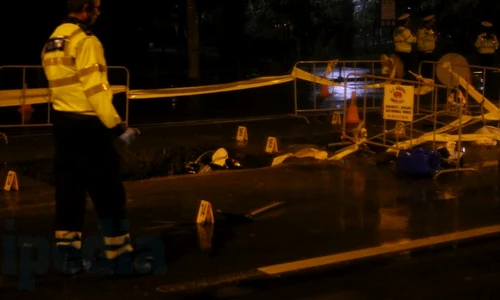 Polițistul a căzut în groapa adâncă de doi metri, săpată de Distrigaz pe Știrbei Vodă jpeg