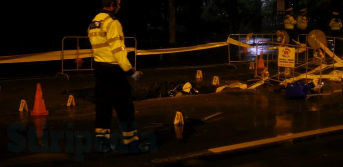 Polițistul a căzut în groapa adâncă de doi metri, săpată de Distrigaz pe Știrbei Vodă