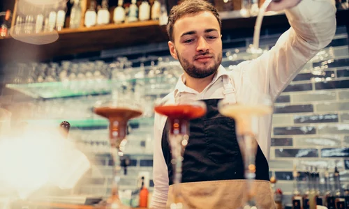 handsome bartender making drinking cocktails counter jpg