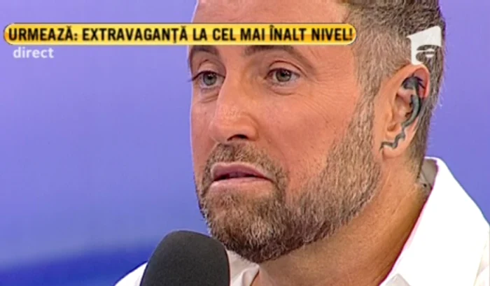 Botezatu are tatuat un dragon de foc în ureche