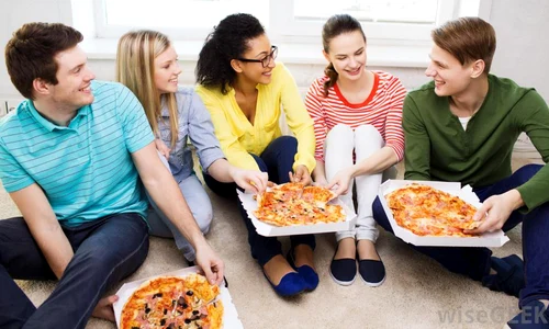 group of friends eating pizza jpeg