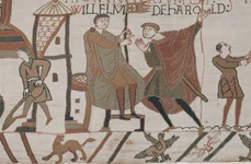William Cuceritorul, reprezentat pe Tapiseria de la Bayeux, ținând un gonfalon papal (steag ceremonial) cu o cruce de aur, un cadou de la Papa Alexandru al II-lea