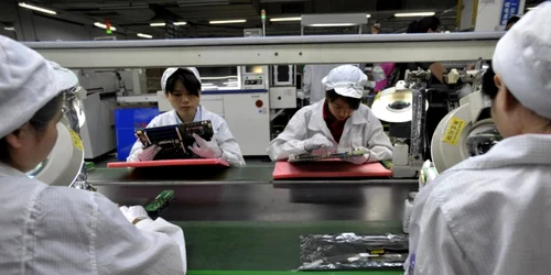 muncitori chinezi electronice afp