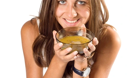 Woman eating soup jpeg