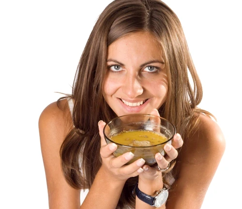 Woman eating soup jpeg