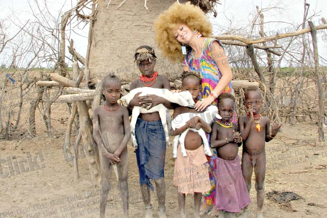 Delia Matache a purtat mai  mereu o perucă „africană”,  ca să dea bine în poze