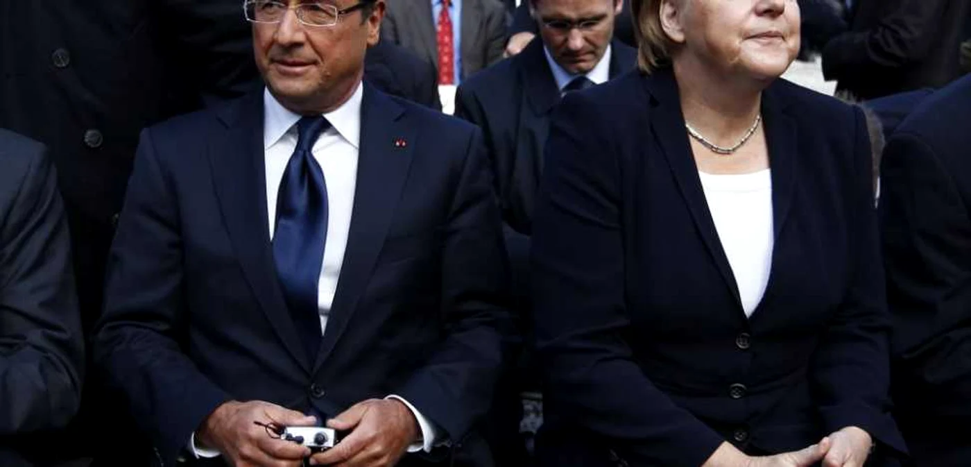 Preşedintele francez François Hollande şi cancelarul german Angela Merkel FOTO: Reuters