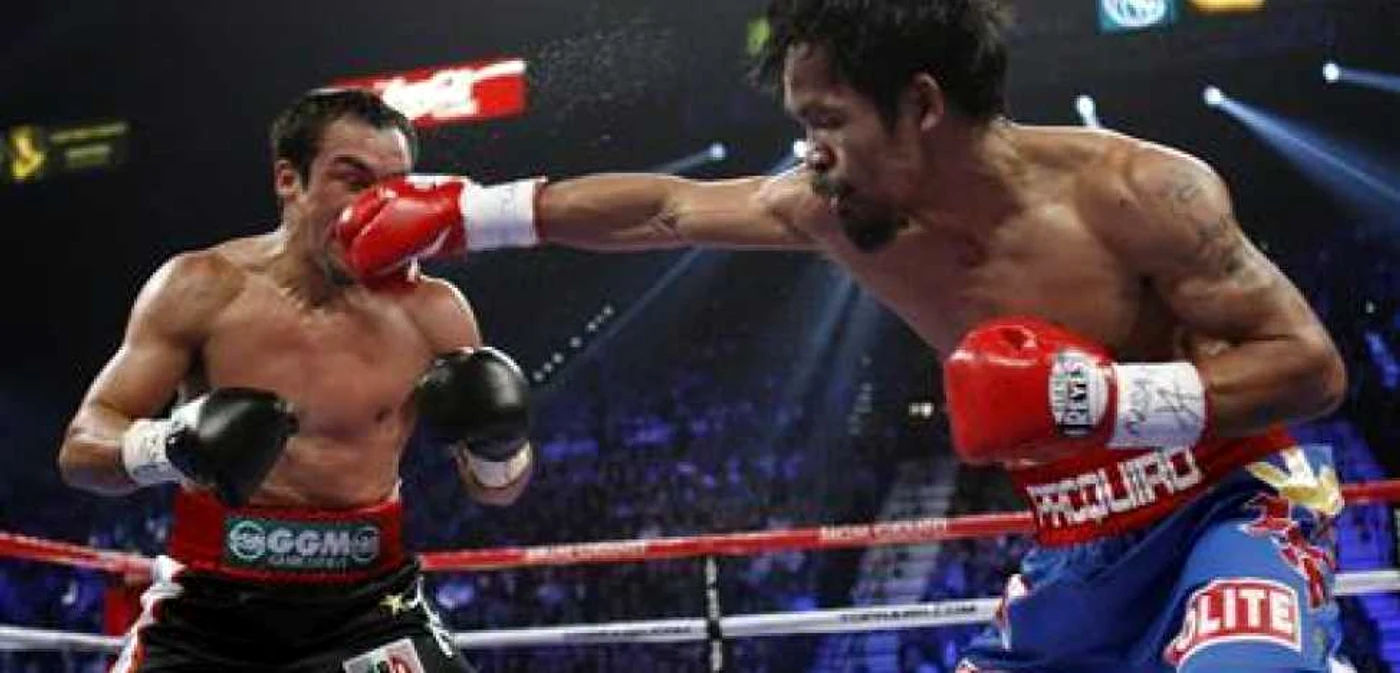 Pacquiao (dreapta) este una dintre figurile importante ale sportului mondial