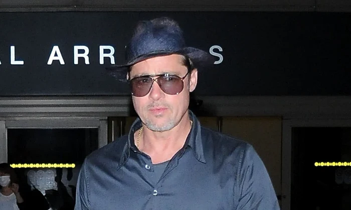 Brad Pitt Arriving On A Flight At LAX jpeg