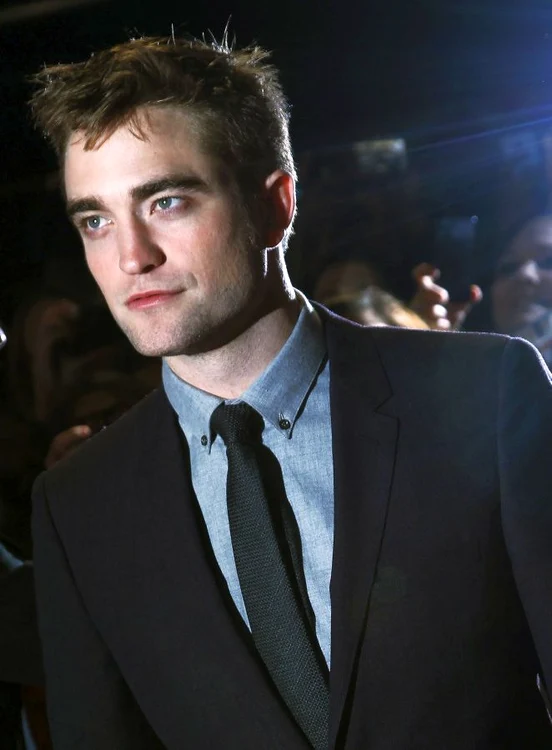 Robert Pattinson s-a împăcat cu Kristen Stewart, deşi familia lui, iniţial, nu a primit vestea prea bine. (Foto: Reuters)