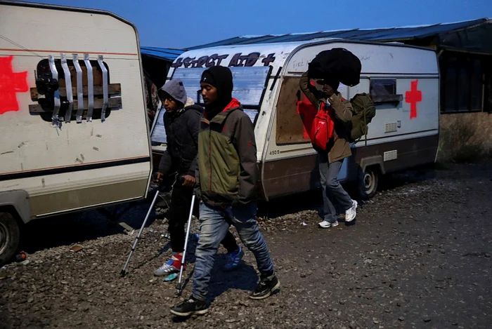 Migranţi din „jungla“ de la Calais FOTO Guliver / Getty Images / Christopher Furlong