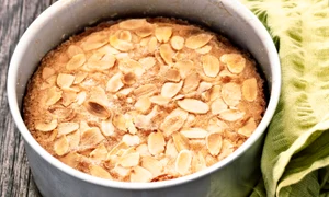 37109758   close up of rustic swedish almond cake in baking tin jpeg