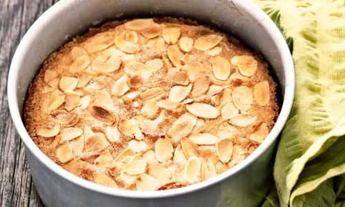 37109758 close up of rustic swedish almond cake in baking tin jpeg