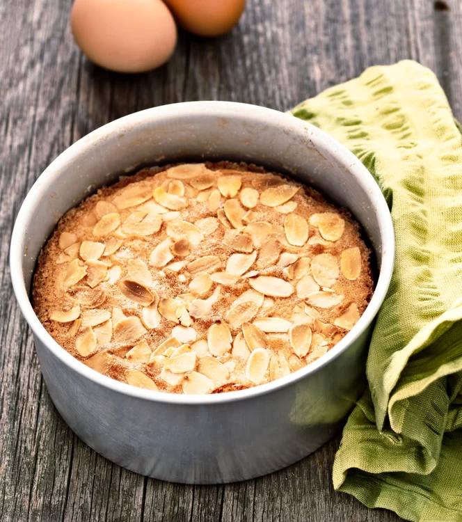 37109758   close up of rustic swedish almond cake in baking tin jpeg