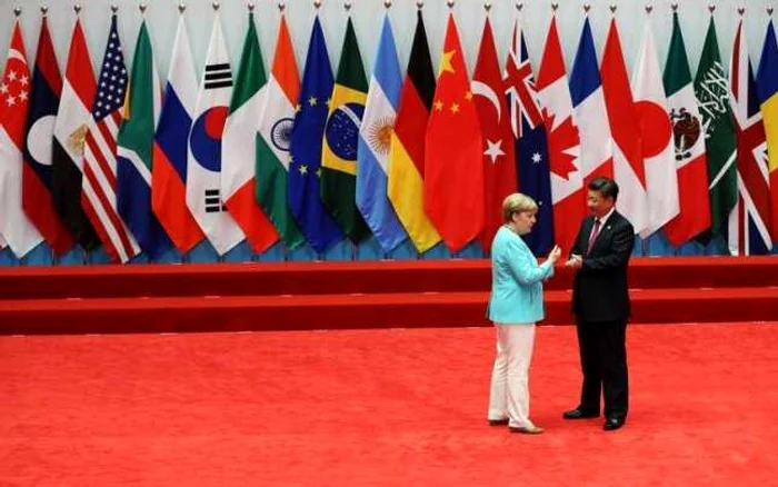 La G20, liderul informal al Uniunii Europene, cancelarul german Angela Merkel, în dialog, fără translator, cu liderul de facto al Asiei, preşedintele chinez Xi Jinping,.