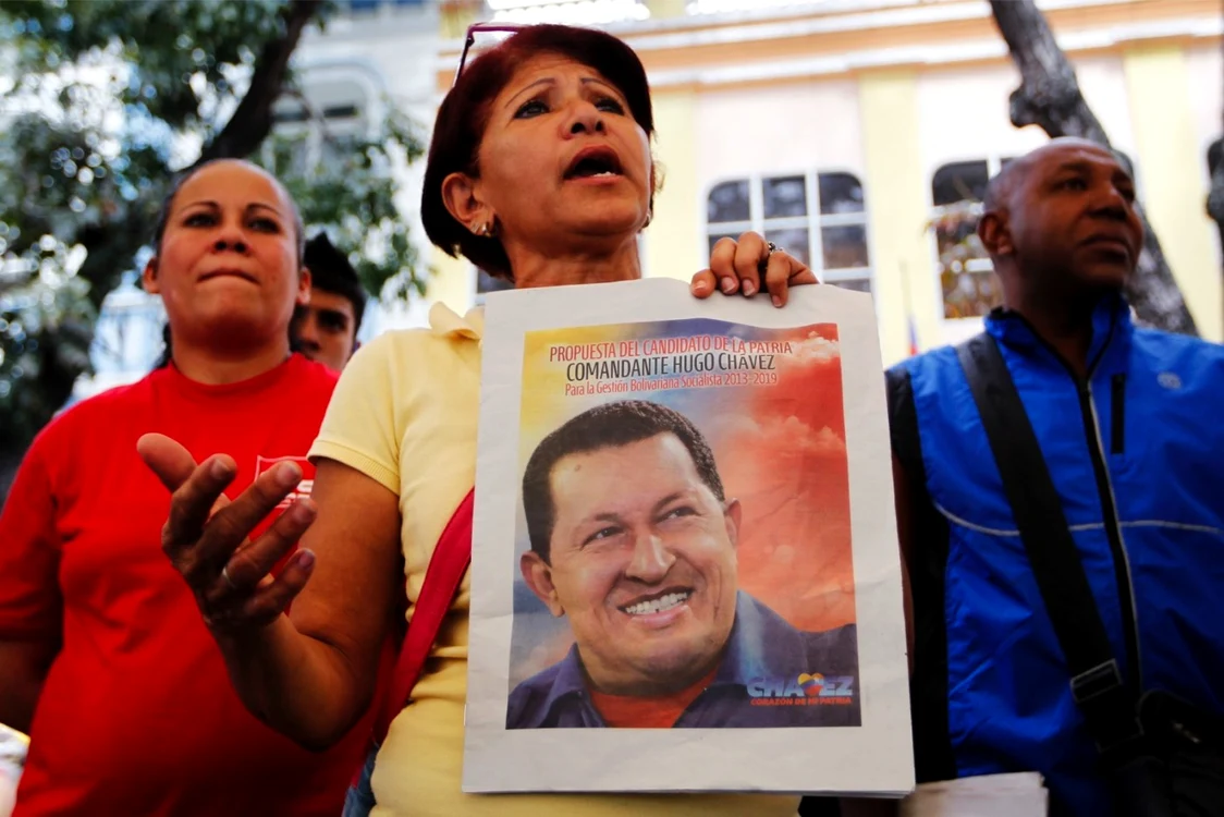Locuitorii dintr-o mahala din Caracas afişează mesaje de susţinere şi se roagă pentru sănătatea lui Hugo Chavez FOTO Reuters