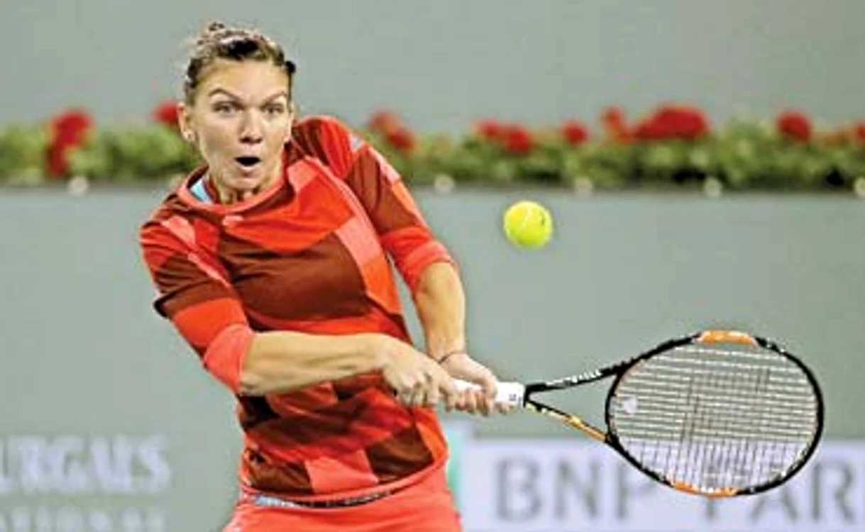 Smiley şi Horia Tecău au încurajat-o pe Simona în victoria de la Indian WellsFoto: Gettyimages