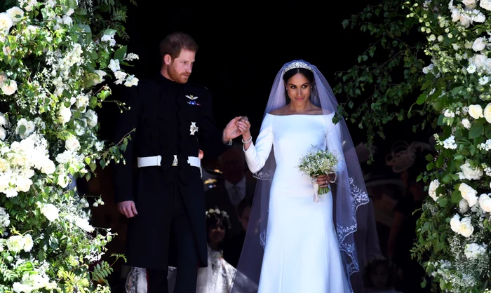 Aranjamentele florale cu trandafiri parfumați și rochia de mireasă a lui Meghan Markle au costat circa un milion de lire sterline Foto: Epa