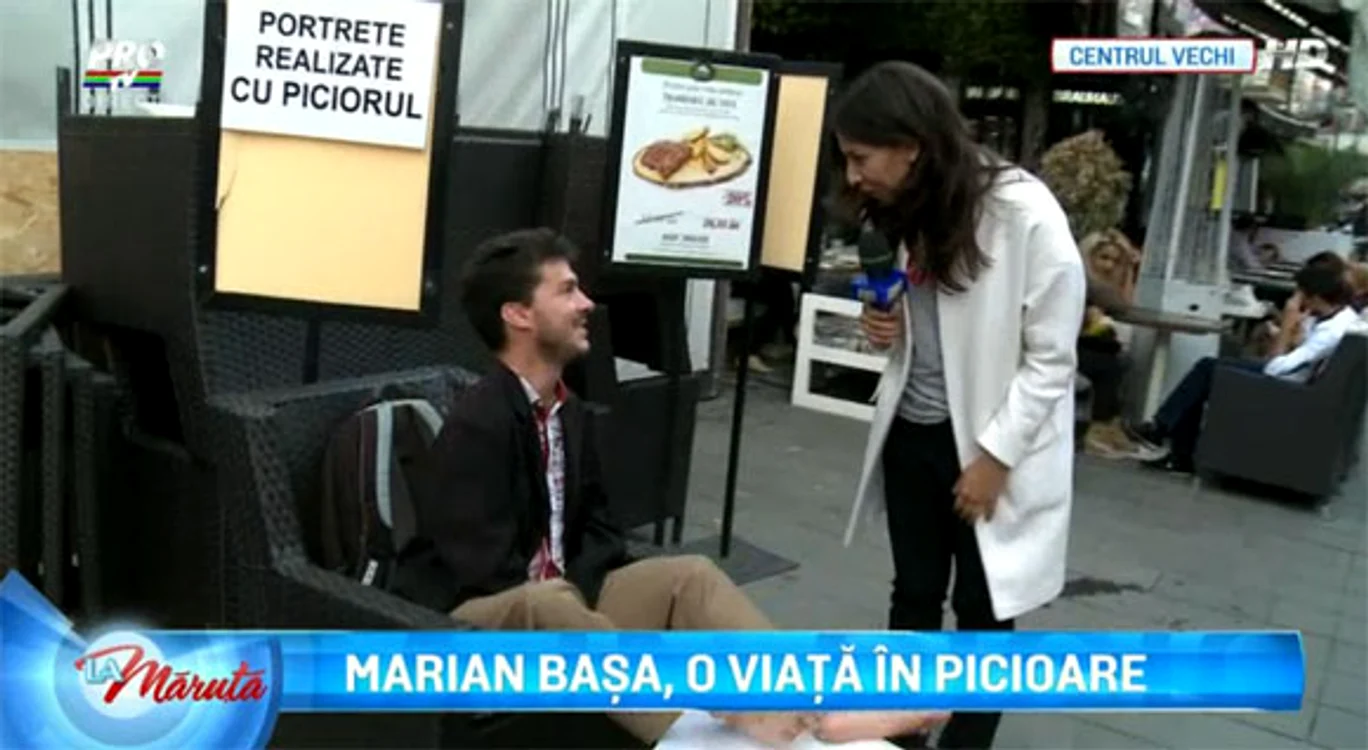 Marian Başa a fost vizitat la locul unde face portrete în Centrul Vechi
