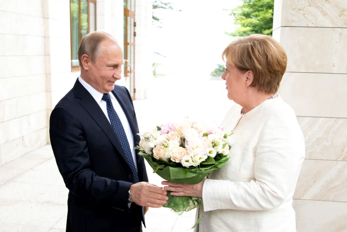 Angela Merkel, liderul occidental care a contribuit cel mai mult la onorabilizarea şi îmbogăţirea Rusiei lui Putin. FOTO: Getty Images