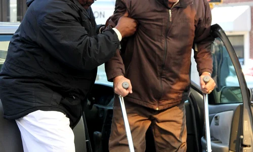 An older looking Robert De Niro sports crutches while filming "The Irishman" with Anna Paquin jpeg