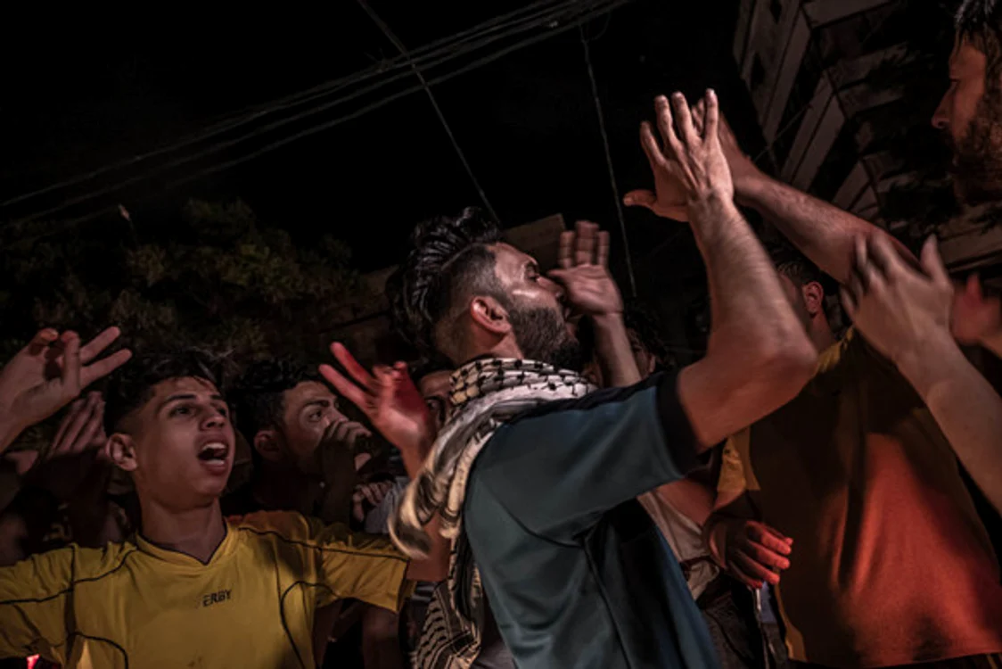 
    Palestinienii au ieșit în stradă după încetarea foculuiFoto: Getty  