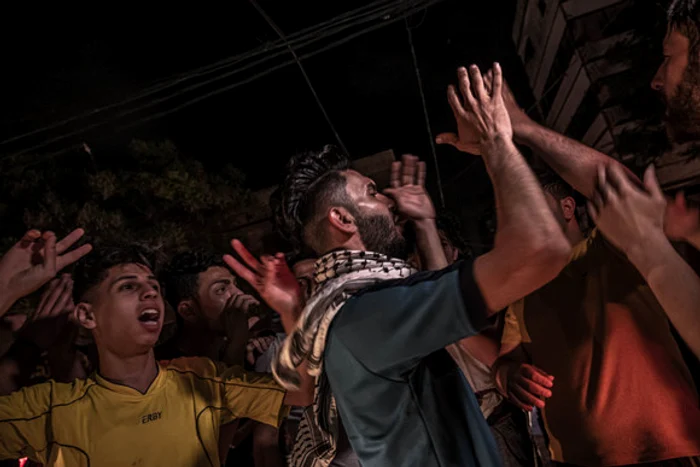 
    Palestinienii au ieșit în stradă după încetarea foculuiFoto: Getty  