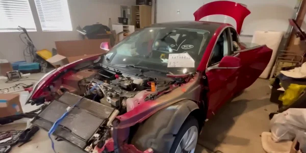 Wrecked Tesla Model 3 with a surprise jpg